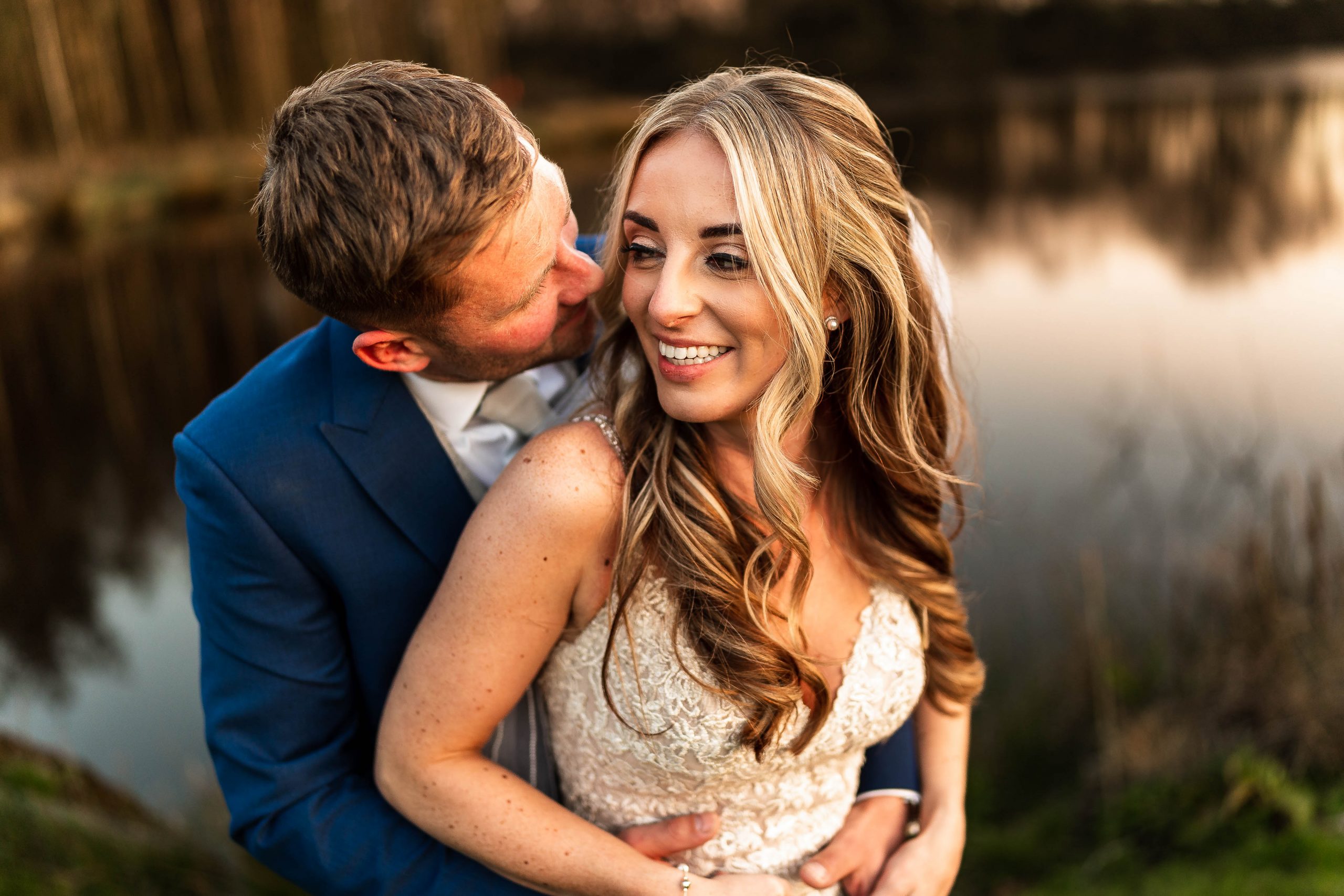 Brid and groom portrait in front of Darwin lake