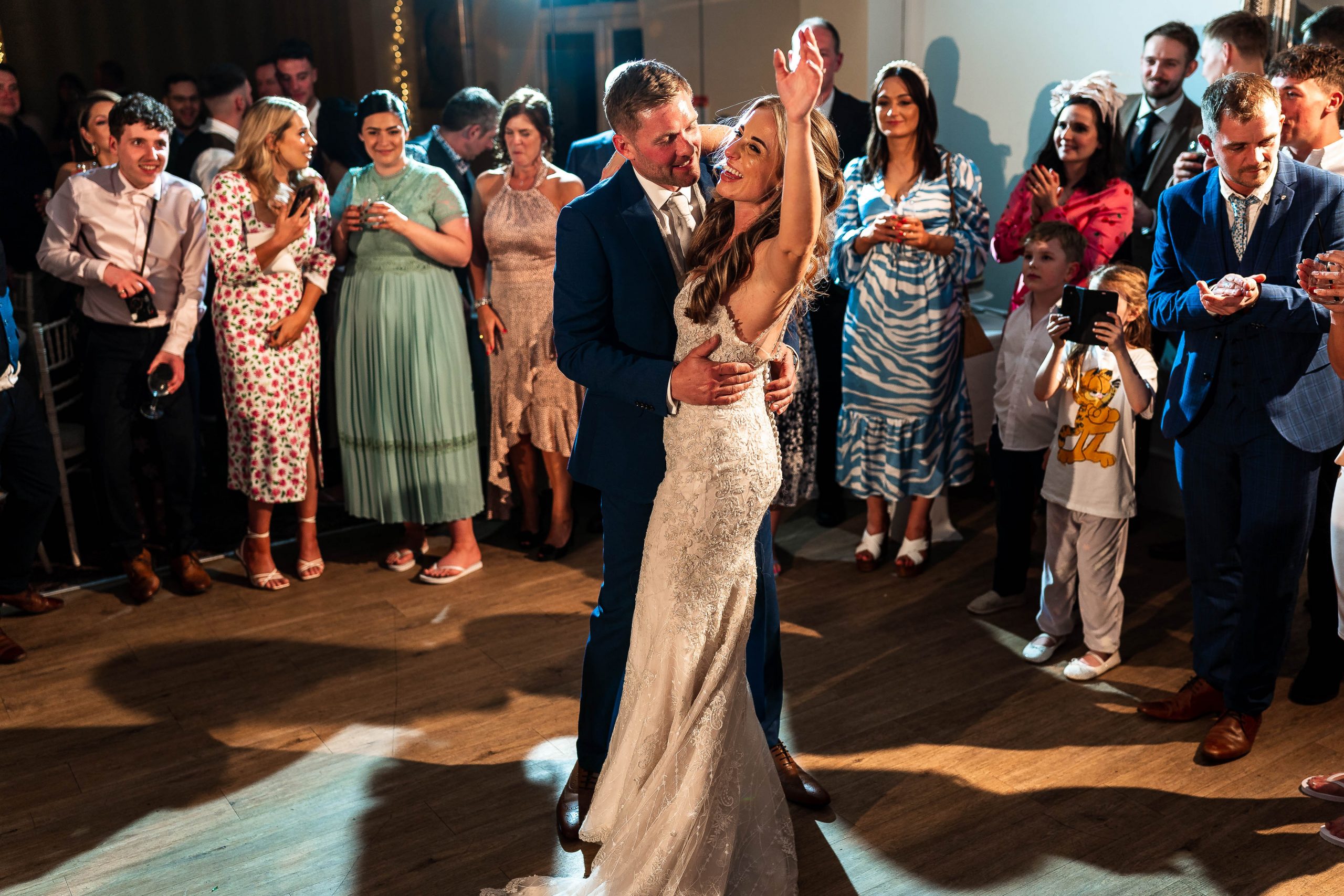 Bride and groom laugh during first dance