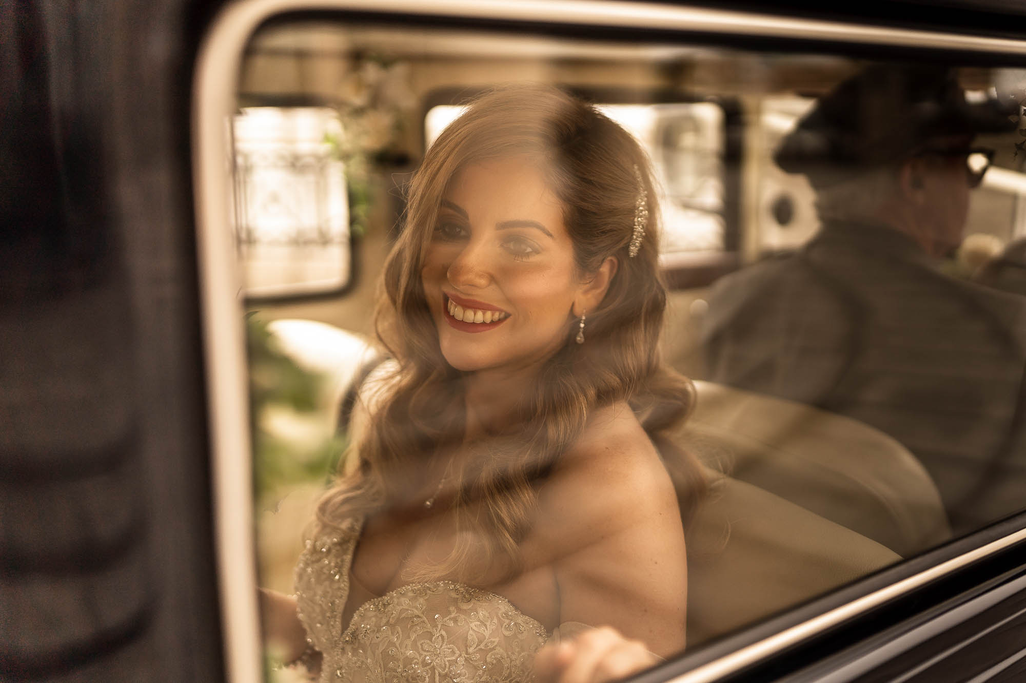 Bride arrives in wedding car