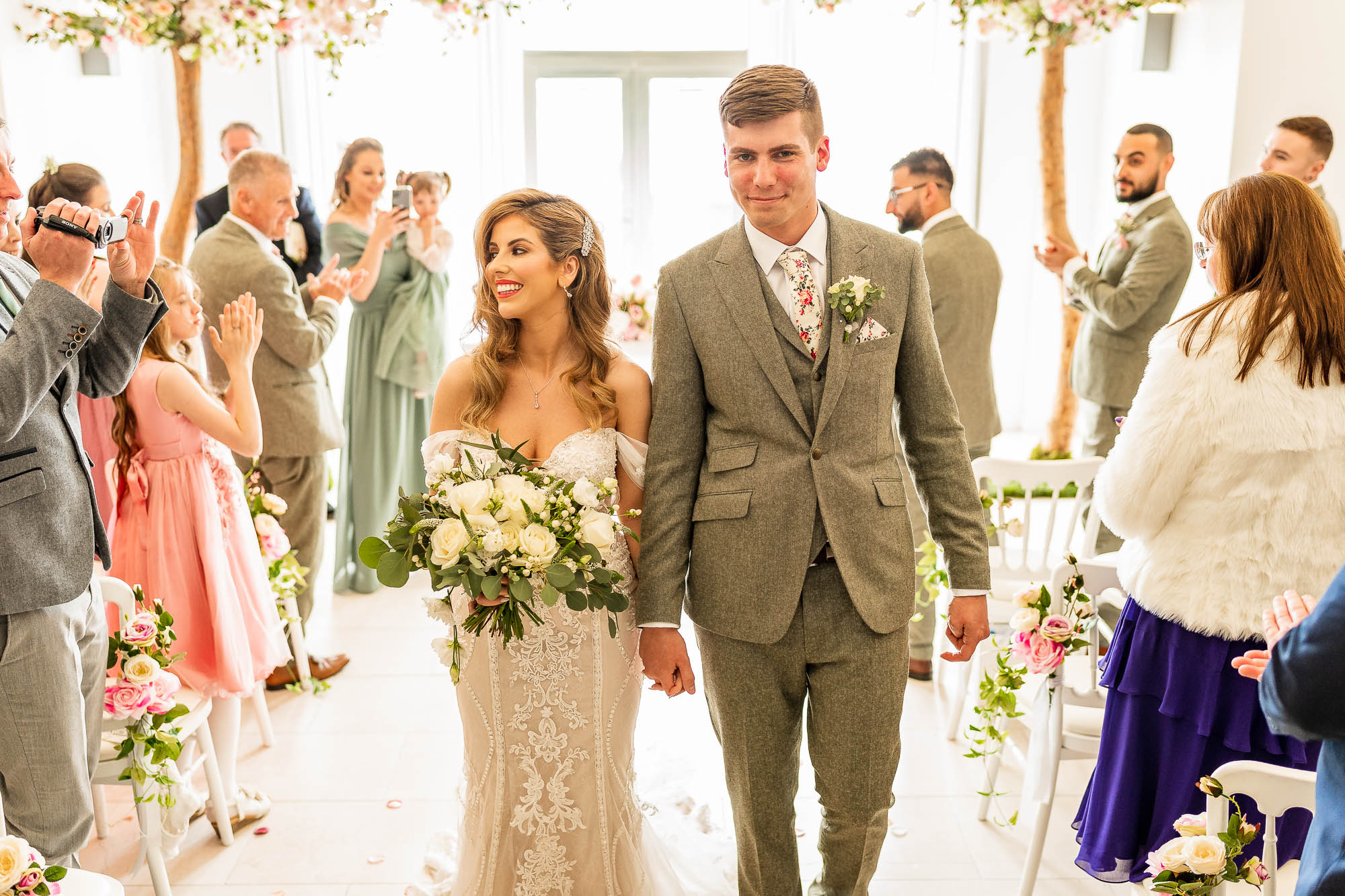 The happy couple walk back down the aisle