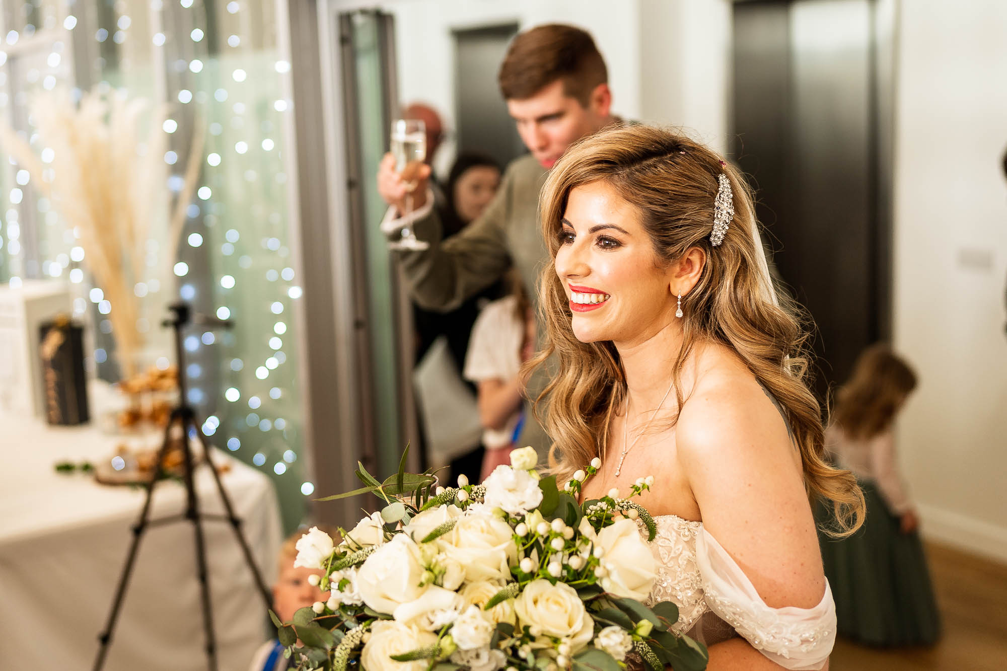 Bride and groom enter the drinks reception