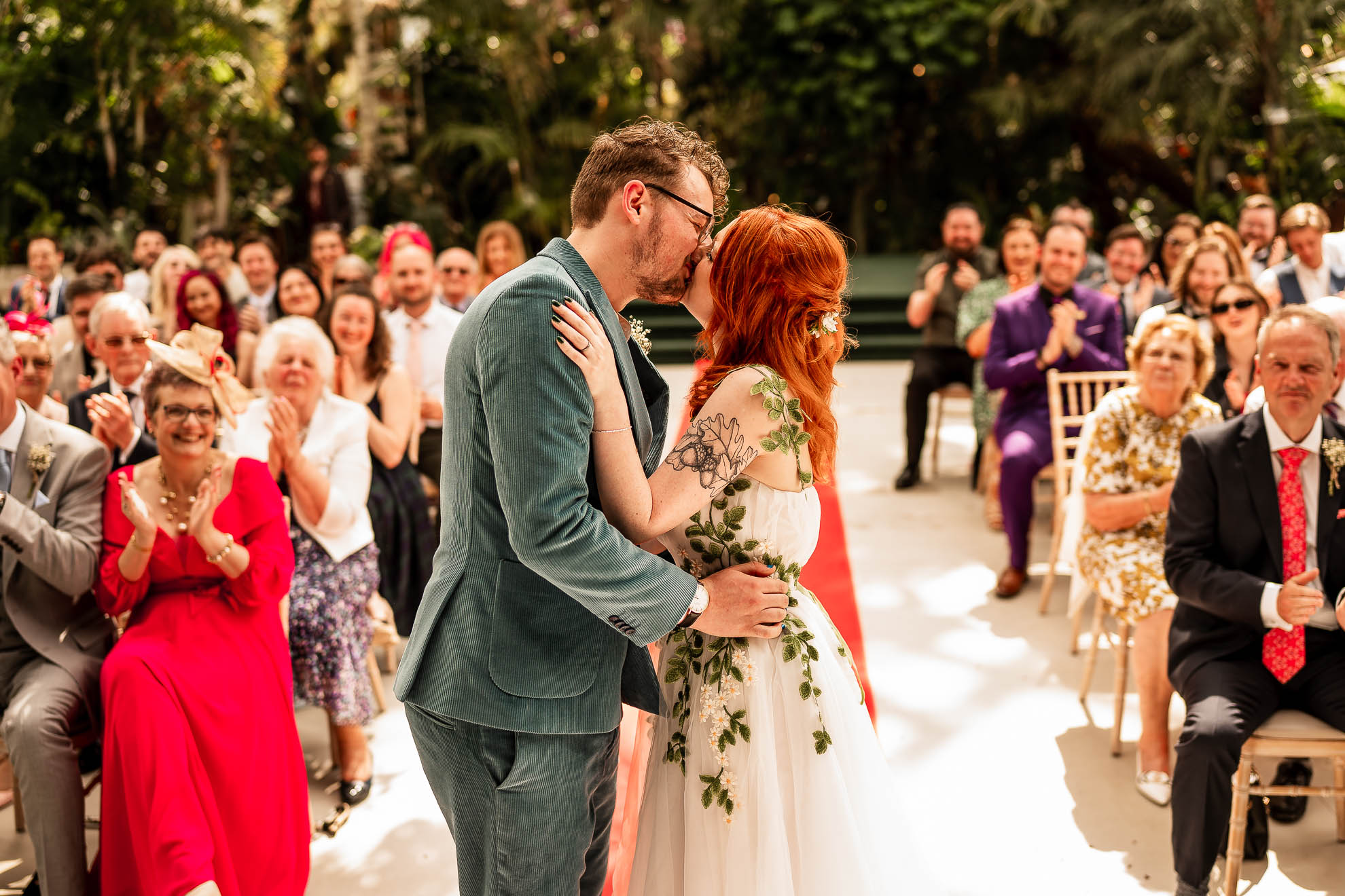 Bride and groom kiss