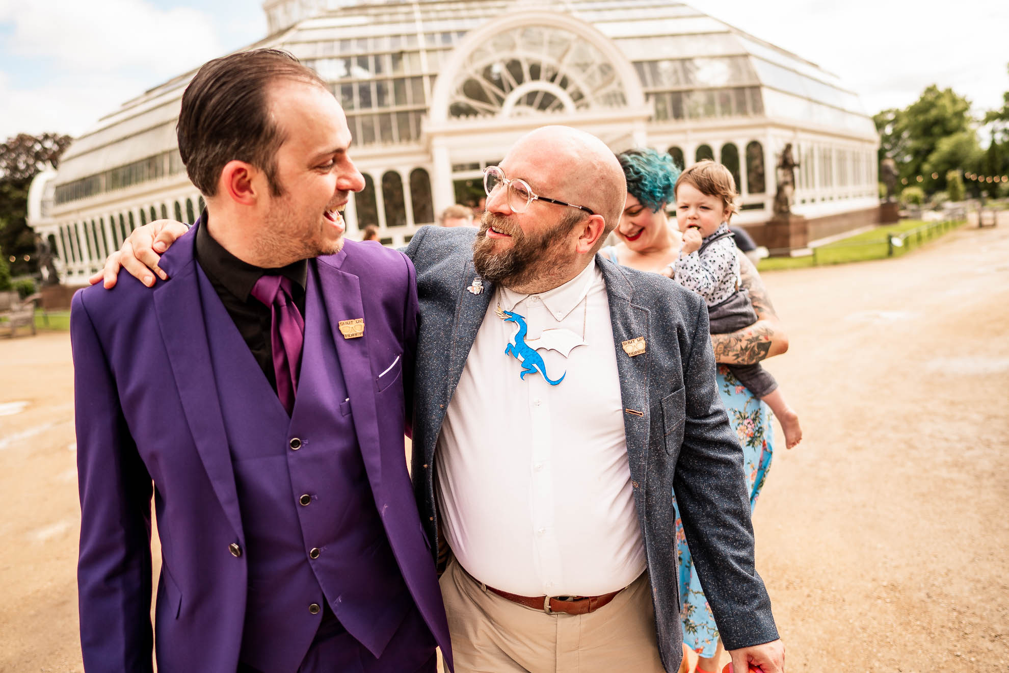 wedding guests share a joke