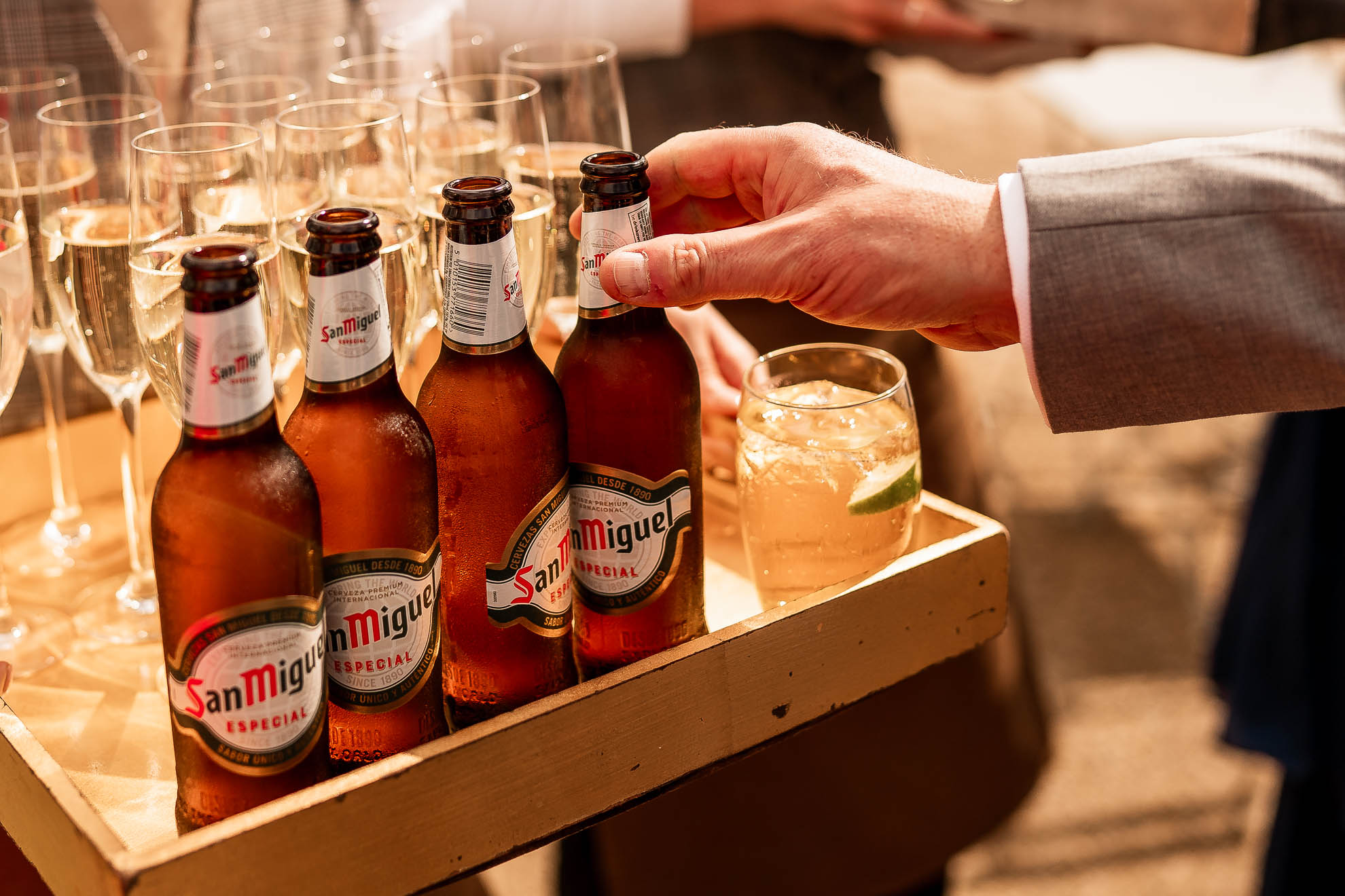 Groom helps himself to a beer