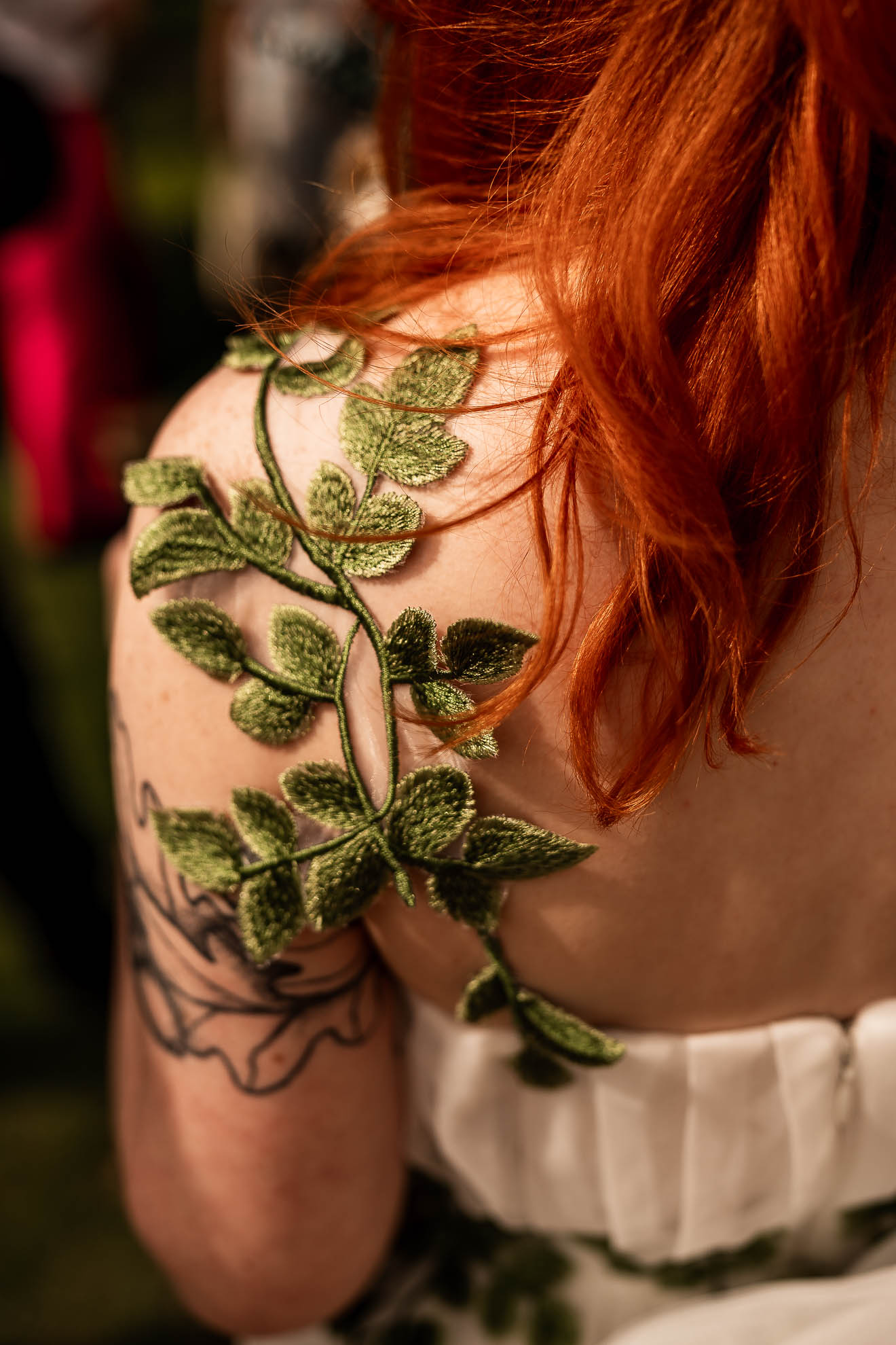 Flower details on brides wedding dress