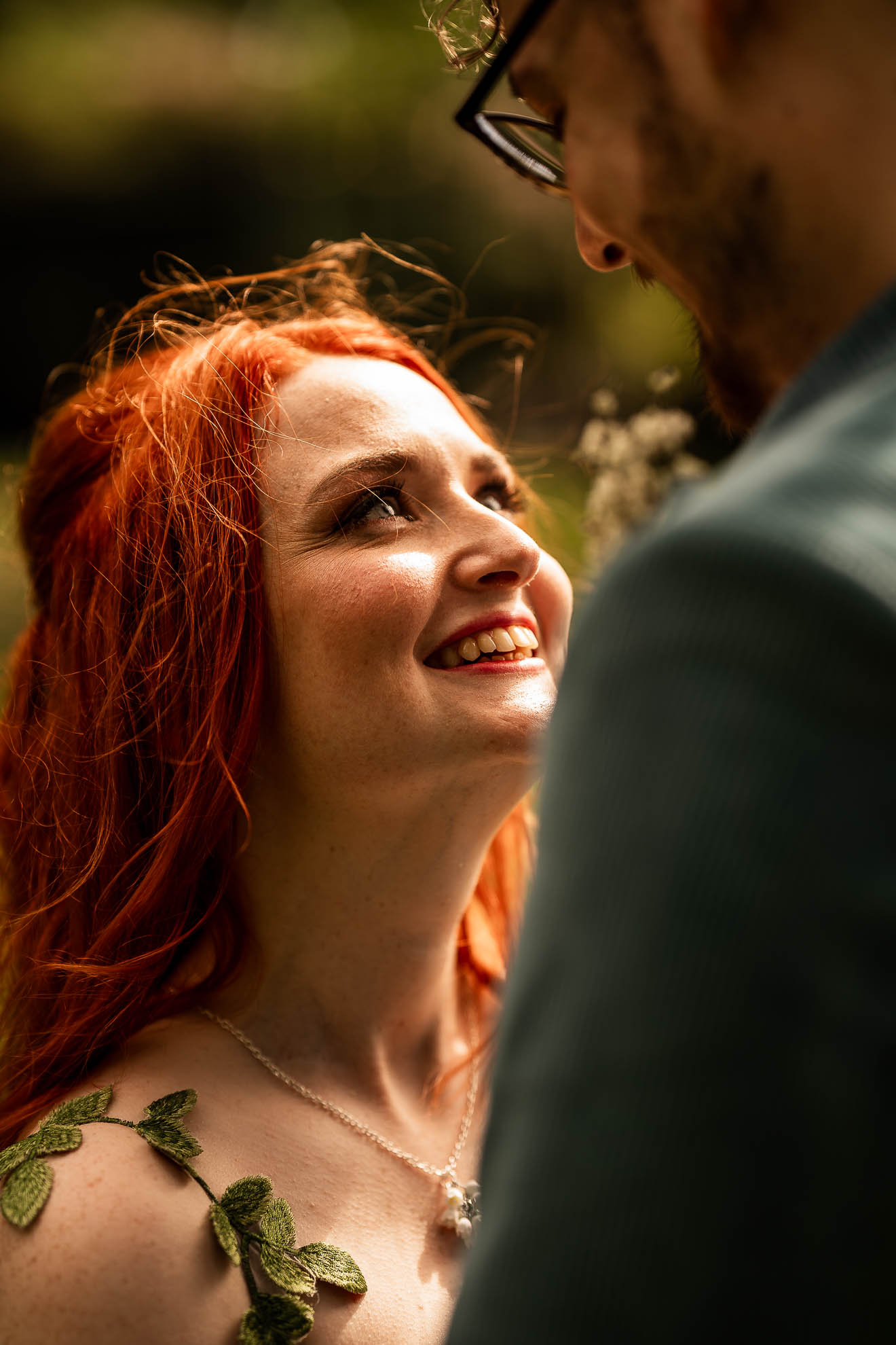 Close up of bride smiling at groom