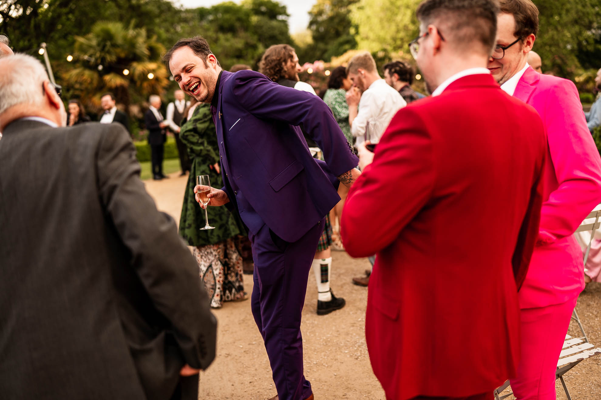 wedding guests share a joke
