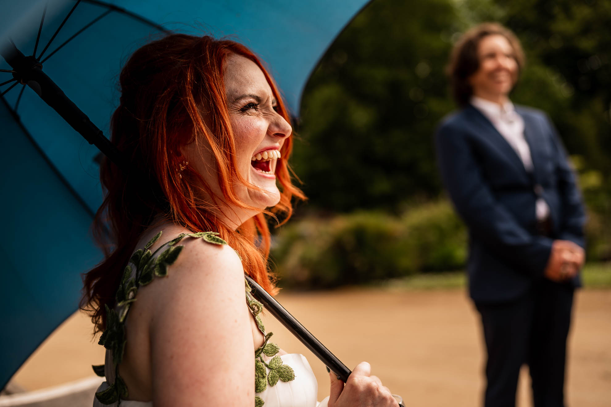 Bride sharing a joke with bridesmaids