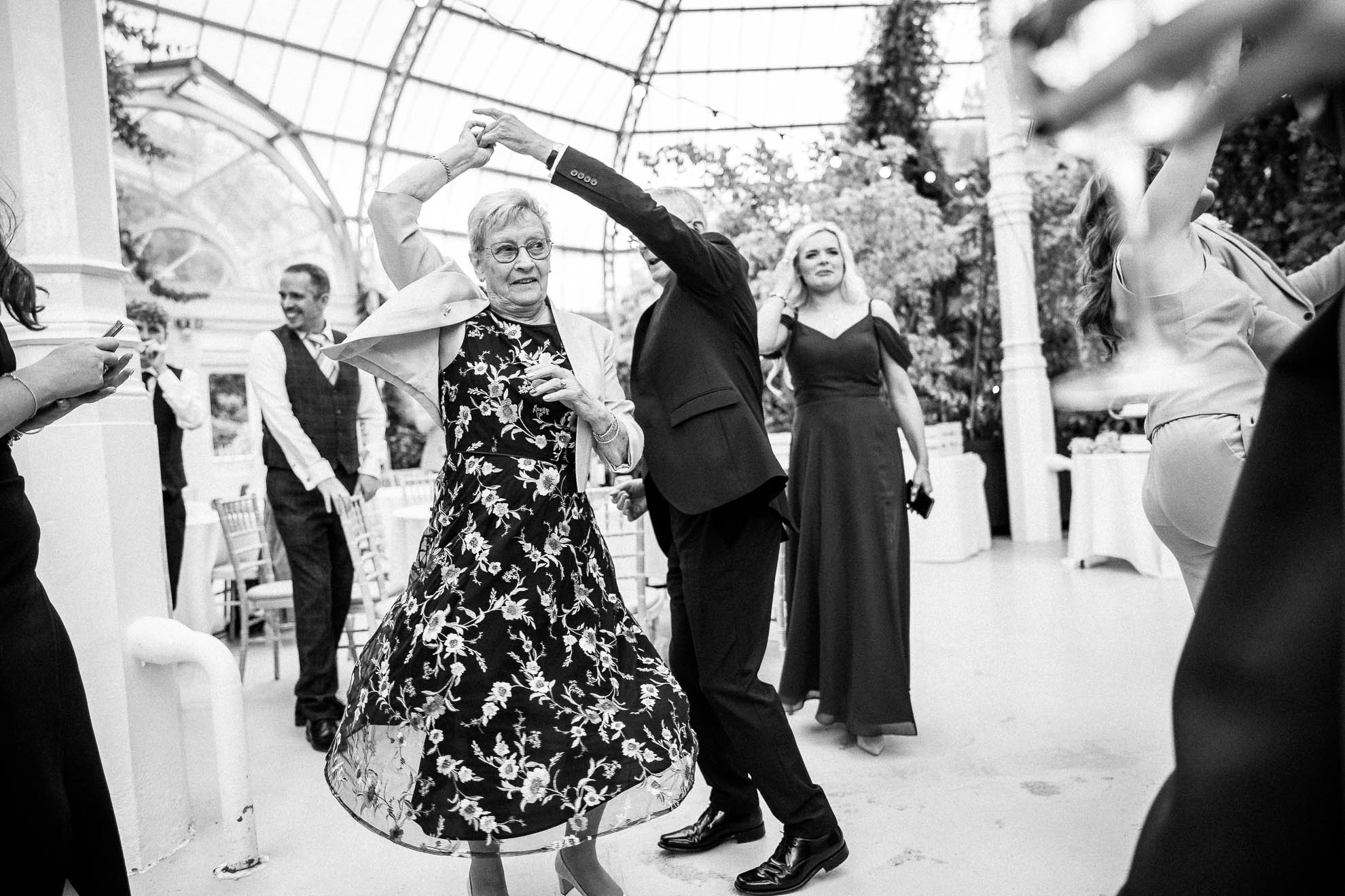 Man spins his wife while dancing