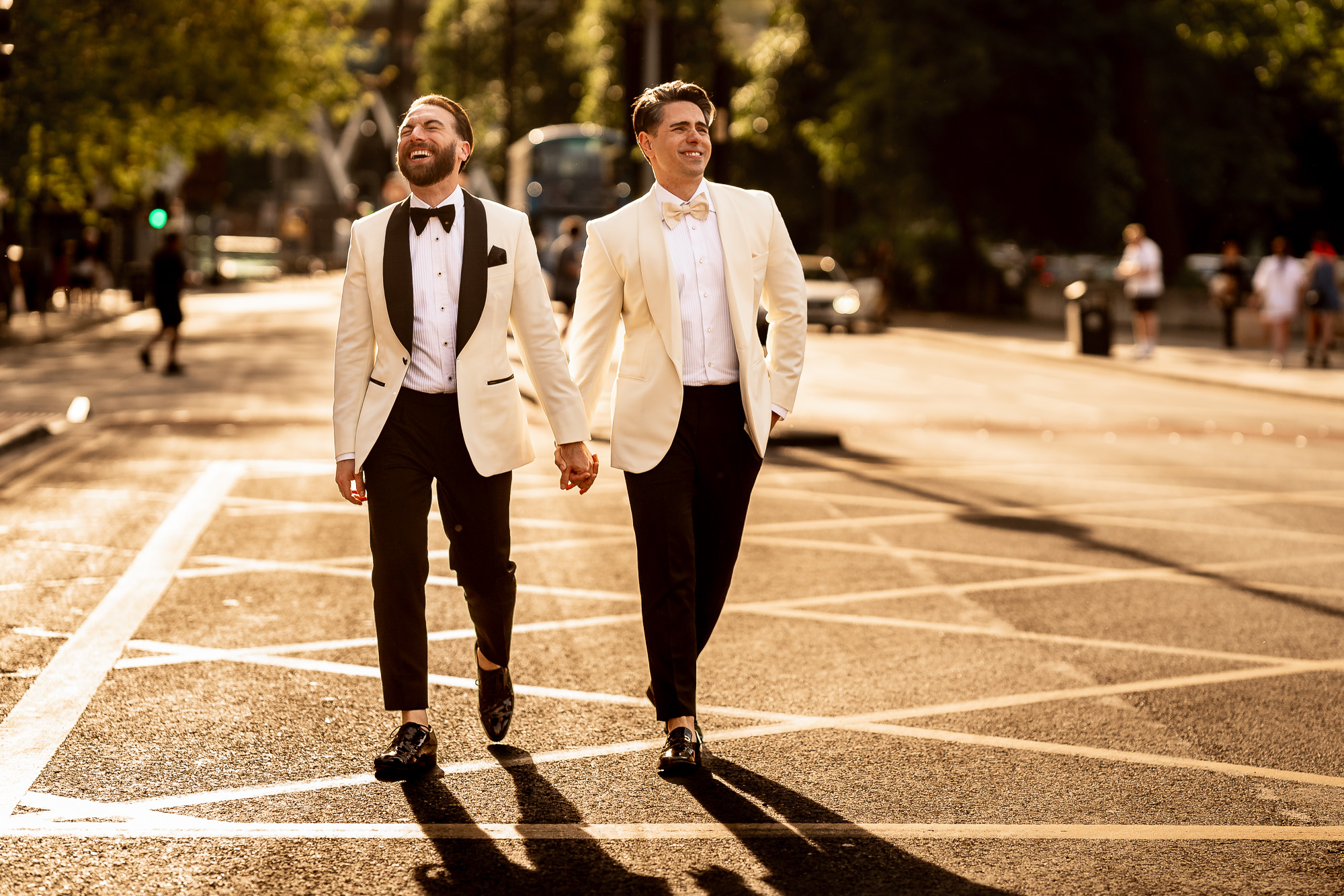 newly weds walk together in the sunshine in Cheshire