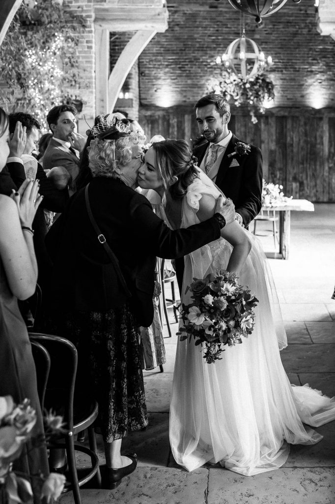 Bride is kissed by her nan