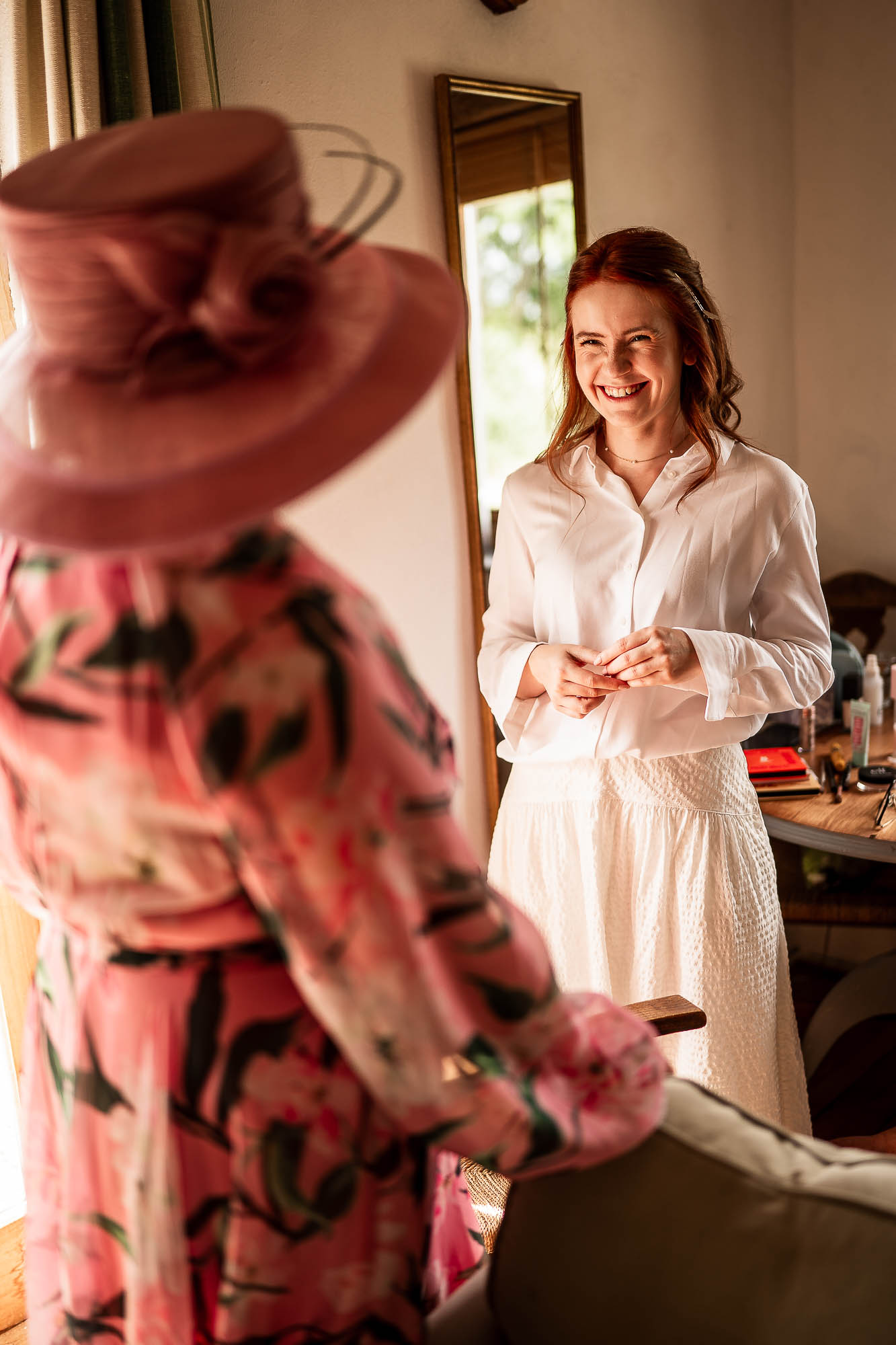 Bride smiling during morning preparations at Wonwood Barton