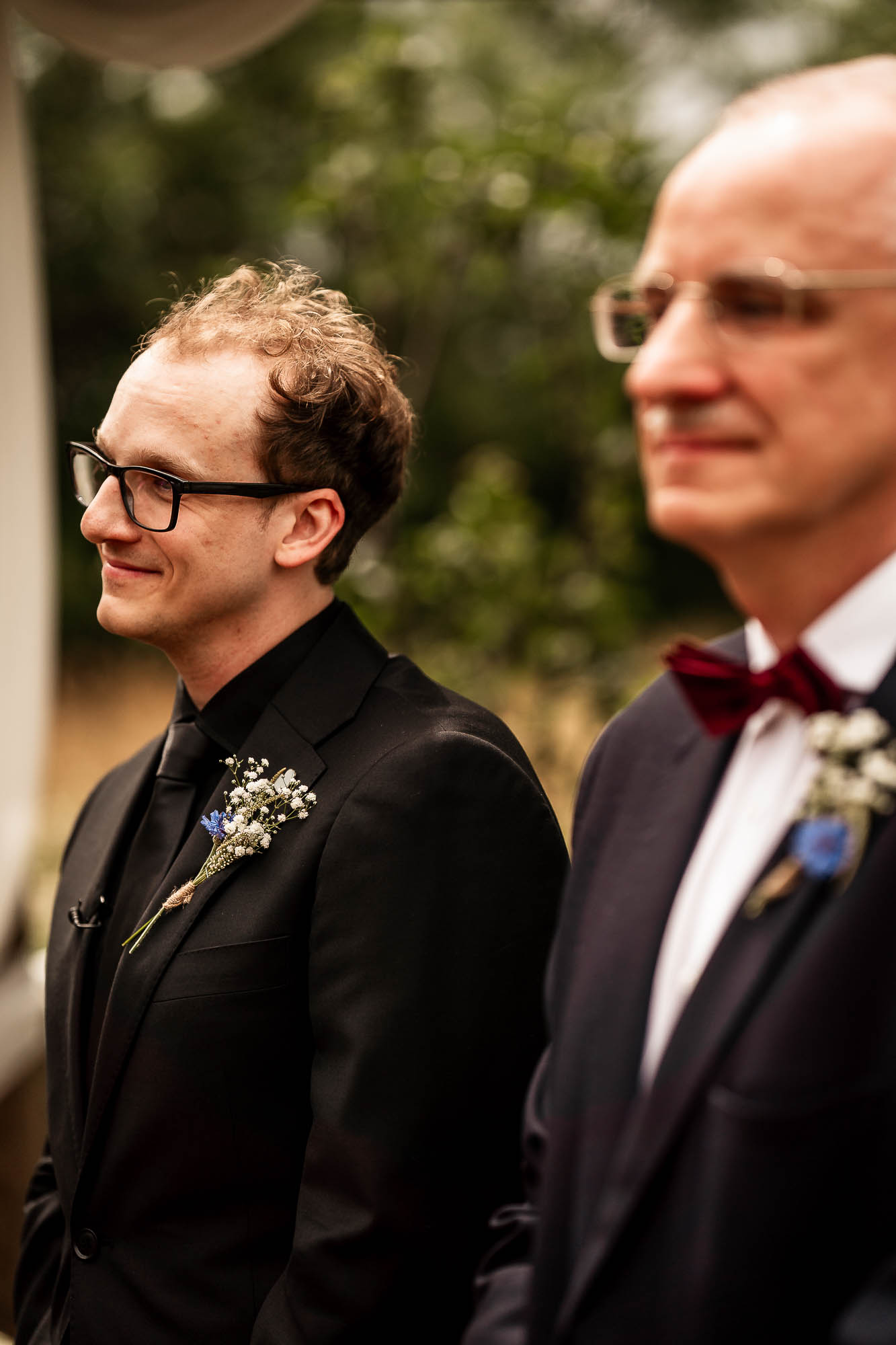 Groom waiting at outdoor ceremony space at Wonwood Barton wedding venue