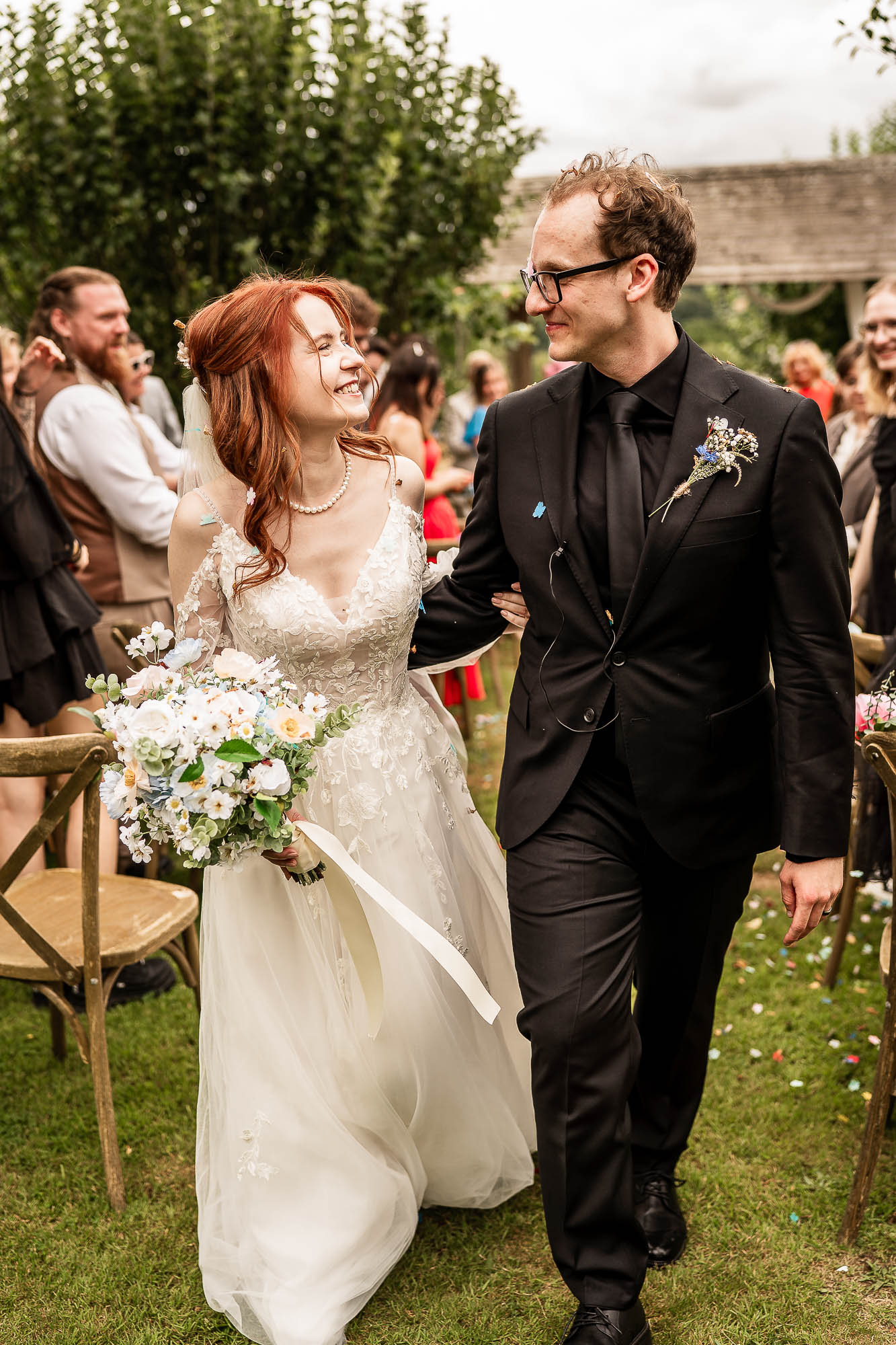 Confetti moment as bride and groom exit Wonwood Barton ceremony