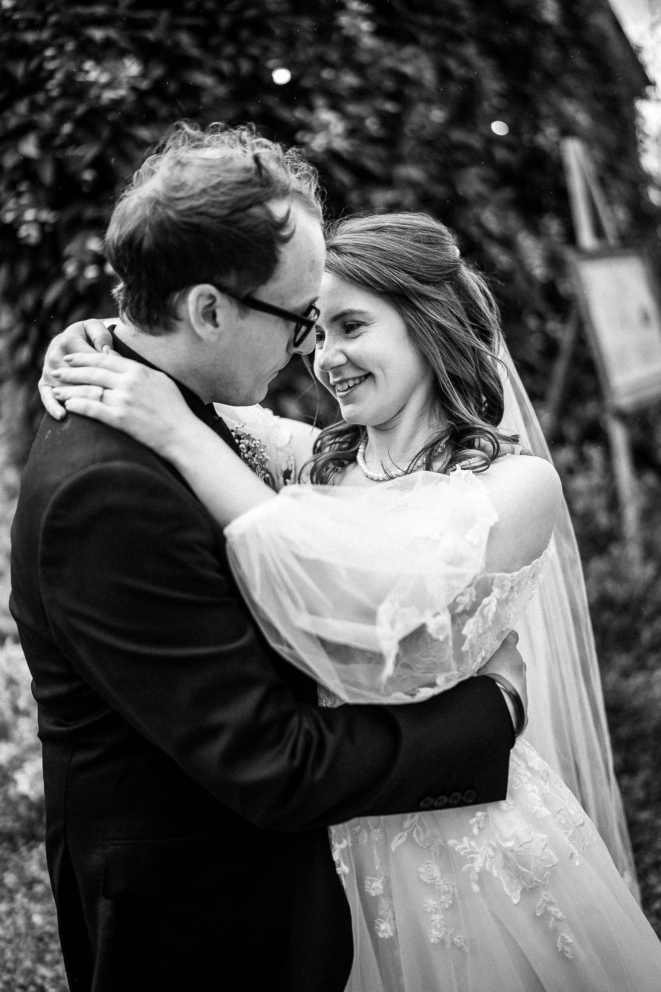 Bride and groom embracing during portrait session at Wonwood Barton in Devon